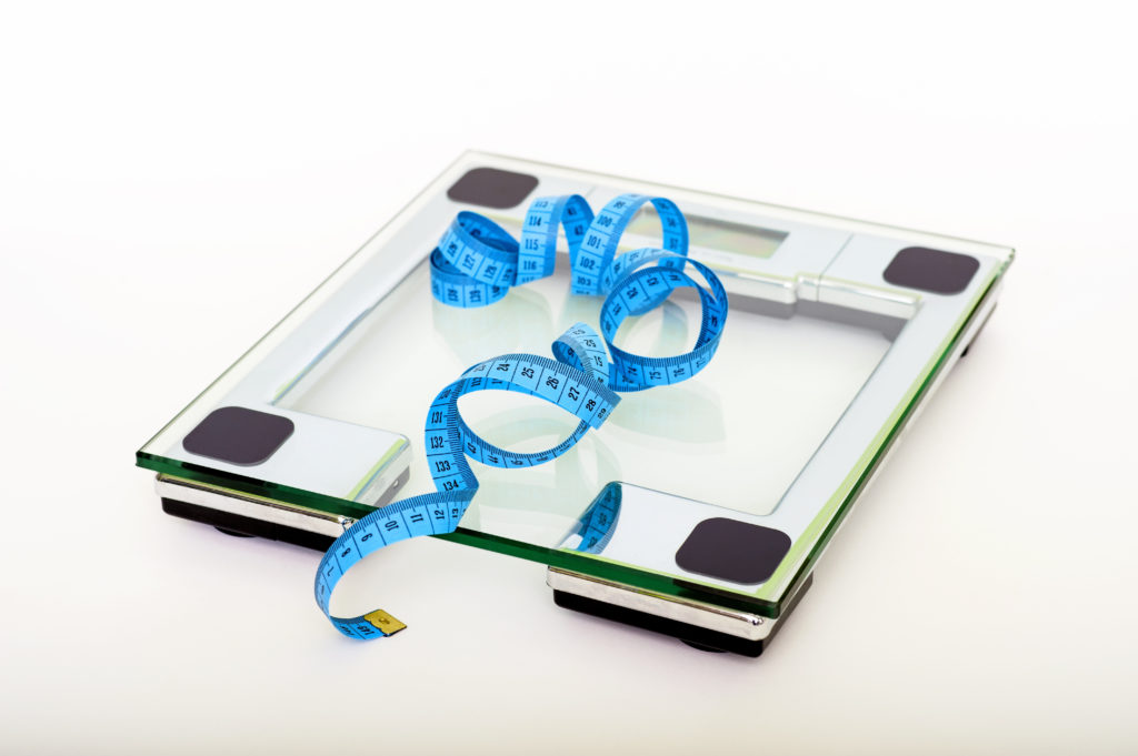 Canva – Blue Tape Measuring on Clear Glass Square Weighing Scale