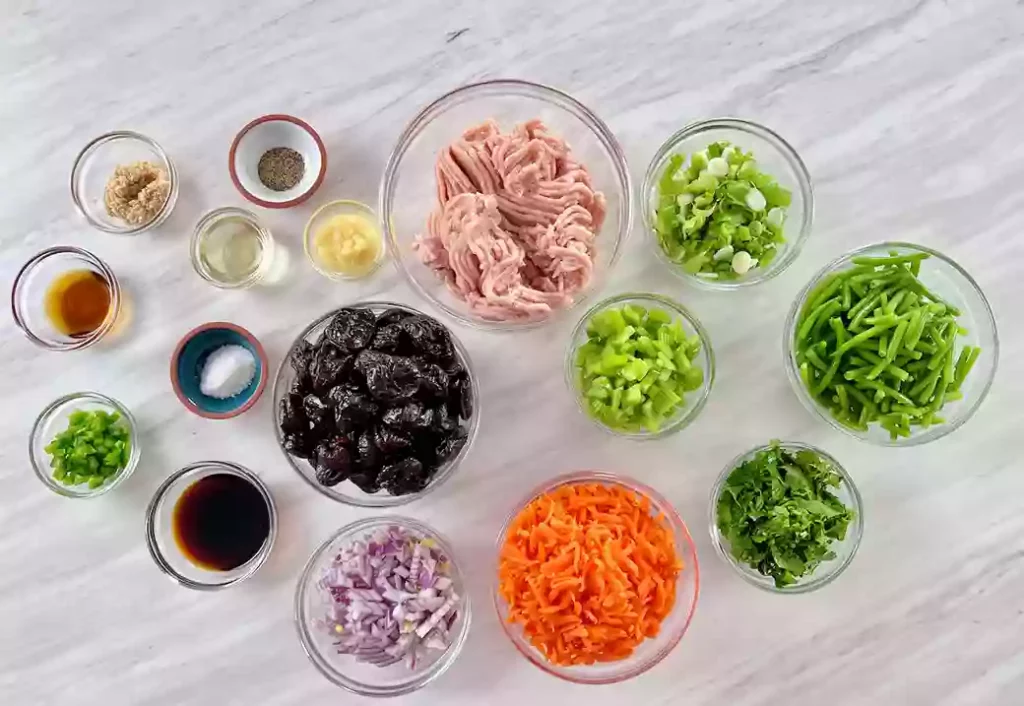 Ingredients in bowls for Ground Chicken Veggie Stir Fry with prune sauce