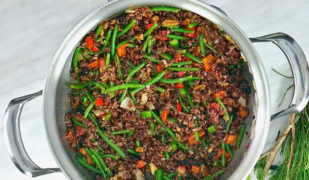 Red rice bowl with veggies and pecans